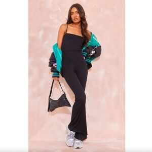 PrettyLittleThing Black Ribbed Strappy Square Neck Flared Jumpsuit